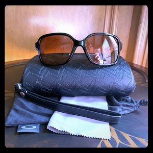 Black Oakley plastic frame sunglasses